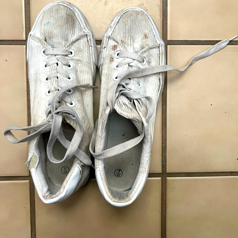 Well worn Sneakers